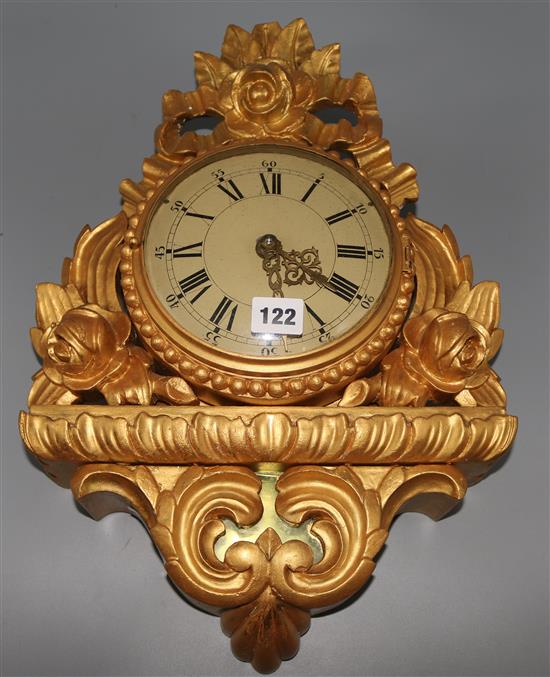 Gilt carved wood cartel clock with battery driven mechanism (Swiss reform movement)